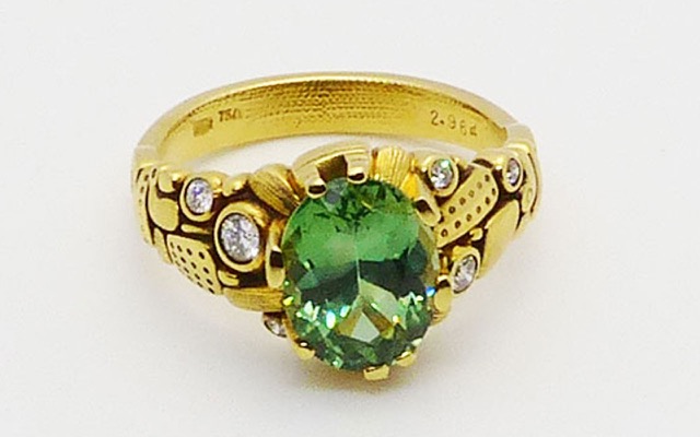 R-91
“Six Prong” chrysoberyl ring, 18K yellow gold, 2.96 ct green chrysoberyl center gemstone, 6 diamonds totaling 0.15 ct. 
Available for immediate delivery in finger size 6 ½ 
$9,125
