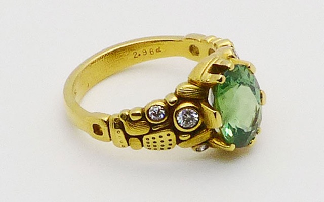 R-91
“Six Prong” chrysoberyl ring, 18K yellow gold, 2.96 ct green chrysoberyl center gemstone, 6 diamonds totaling 0.15 ct. 
Available for immediate delivery in finger size 6 ½ 
$9,125
