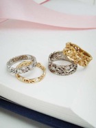 aDmitriy-4-rings-on-book