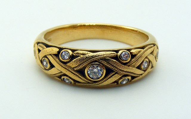 R64
“Vine” diamond ring in 18K yellow gold with 9 diamonds totaling 0.14 ct. 
Available for immediate delivery in finger size 6 ¾.
$2,565
