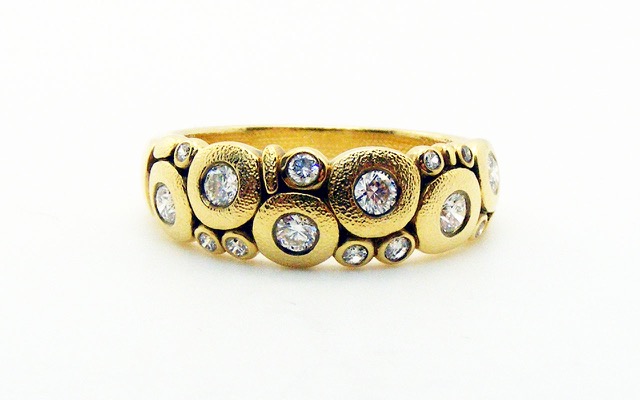 R122D
“Candy” diamond ring in 18K yellow gold with 15 diamonds totaling 0.42 ct. 
Available for immediate delivery in finger size 7.
$3,540
