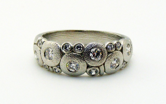 R122PD
“Candy” diamond ring in platinum with 15 diamonds totaling 0.42 ct. 
Available for immediate delivery in finger size 7.
$4,695
