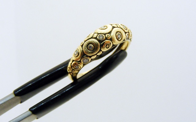 R132
18K yellow gold and diamond “Orchard” dome ring, 12 diamonds totaling 0.11 ct. 
Immediately available in size 6 ¼.
$2,335
