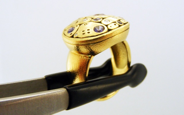 R188S
“Early Spring” sapphire & diamond ring in 18K yellow gold with 7 colored sapphires totaling 0.47 ct. and 7 diamonds totaling 0.08 ct. 
Available for immediate delivery in finger size 6 ¼ 
$4,725
