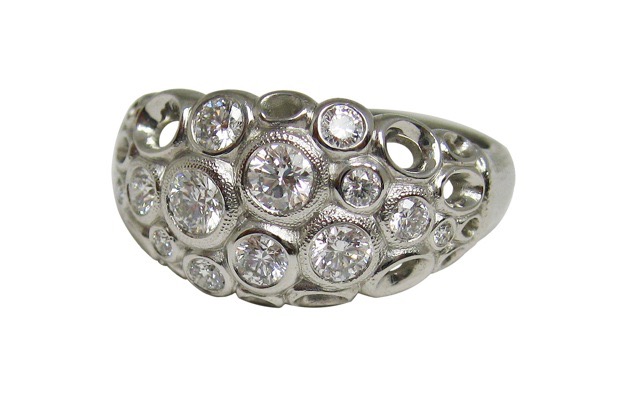 R-68PD
“Open Work” diamond ring, platinum, 13 diamonds totaling 0.60 ct. 
Available for immediate delivery in finger size 7.
$5,685
