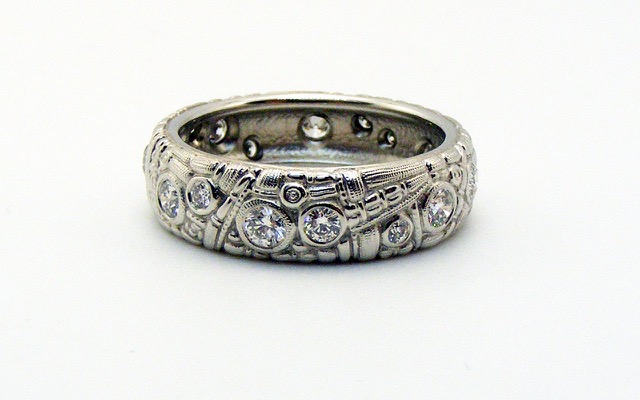 R7PD
Diamond ring, platinum, 6mm wide, 18 diamonds totaling approximately 0.60 ct.
Available for immediate delivery in finger size 6 ¼. 
$6,070.00
