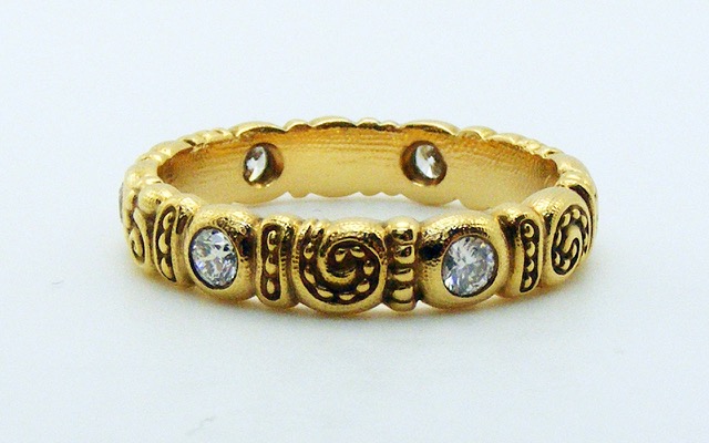 R51R
“Nautilus” 18K rose gold and diamond band, 6 diamonds totaling 0.36 ct., 4mm.
Immediately available in size 7 ¼.
$3,330.00

