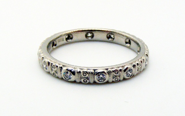 R73P
“Circle” platinum and diamond band, 2.5mm wide, 12-13 diamonds totaling approximately 0.16 ct. Immediately available in size 5 ¾.
$3,290.00

