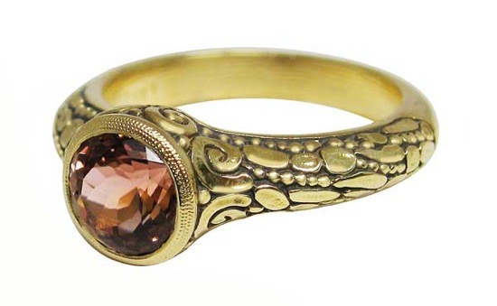 R-42M
18K yellow gold tourmaline ring, 1.59 ct dark pink tourmaline center stone. 
Available for immediate delivery in finger size 6 ½ 
$3,410.00
