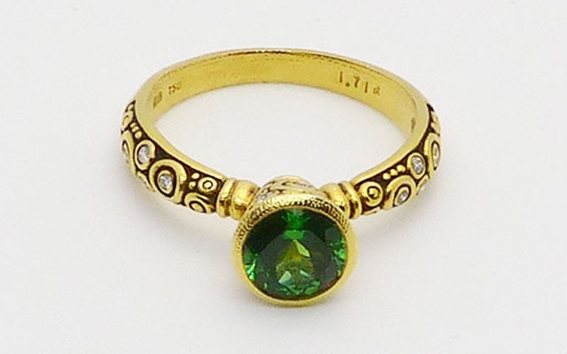 R-128YY7.3
“Martini” tsavorite garnet ring in 18K yellow gold, 1.71 ct Tsavorite Garnet, 17 diamonds totaling  0.20 ct. 
Available for immediate delivery in finger size 6 ½
$7,845
