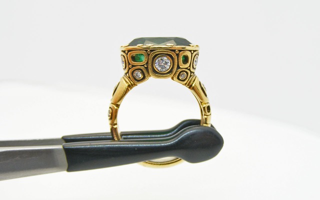 R-108AD (Sold)
“Little Windows” Zambian emerald ring, 18K yellow gold, 6.46 ct Zambian Emerald, 18 diamonds totaling 0.48 ct. 



