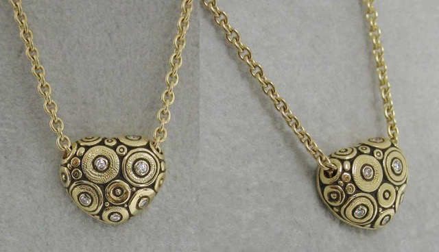 #M2215
“Heart Shaped” Pendant, 18KY, 6 Diamonds = .05 ctw (F-G/VVS) (This item has sold, but can be special ordered.)
 

Also available in 18K Red Gold