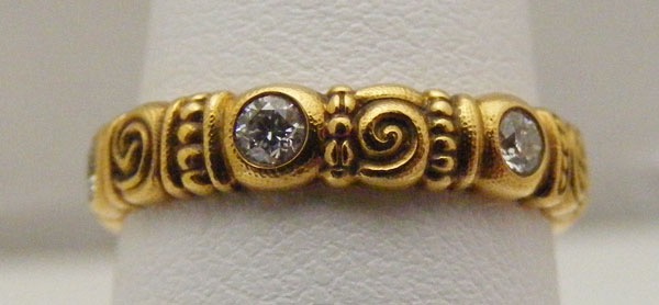 R51R
“Nautilus”, 18K red gold, .36 ctw diamonds, 4 mm wide, in store in size 7 ¼
$3,330
