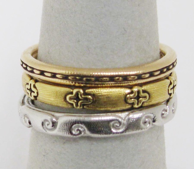 #R60R 
“Dash” ring, 18KR, sz. 6.5, $1,145.00 

#R93
“Little Crosses” ring, 18KY, sz. 6.5, $1,275.00 

#R87P
“Swirling Waters” ring, Platinum, sz. 6.5, $1,915.00