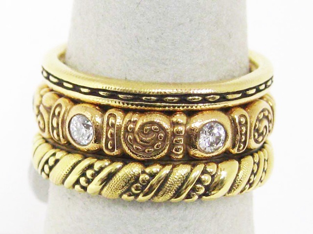 #R60 
“Single Dash” ring, 18KY, sz. 6.5, $1,145.00 

#R51R
“Nautilus” ring, 18KR, diamonds = .36 ctw (F-G/VVS), 4mm, sz. 7.25, $3,330.00 

#R67
“Rope” ring, 18KY, sz. 7.25, $1,860.00 